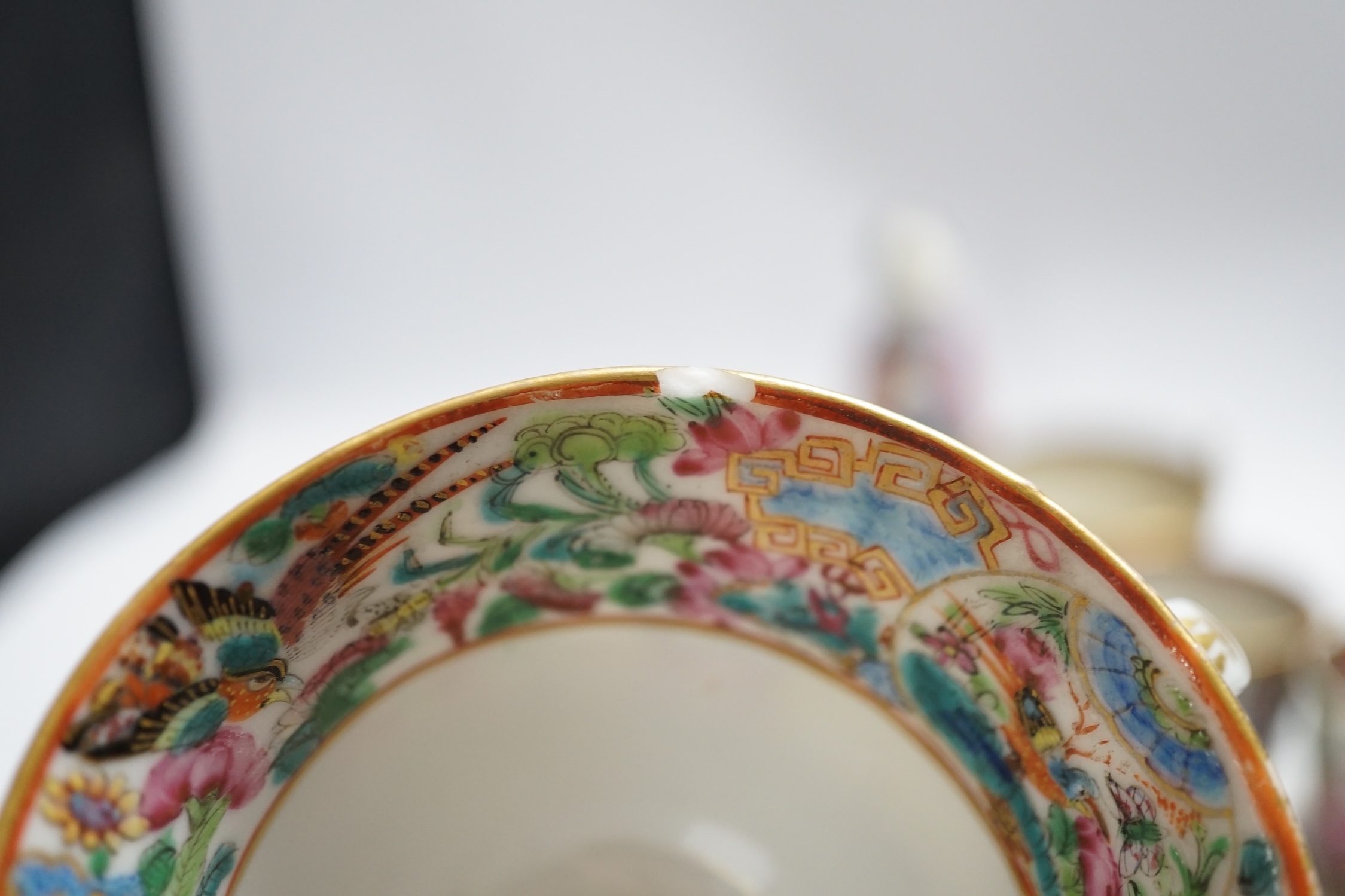 Chinese famille rose porcelain including plates, cups, saucers and a figure, 18th and 19th century, largest 27cm diameter
